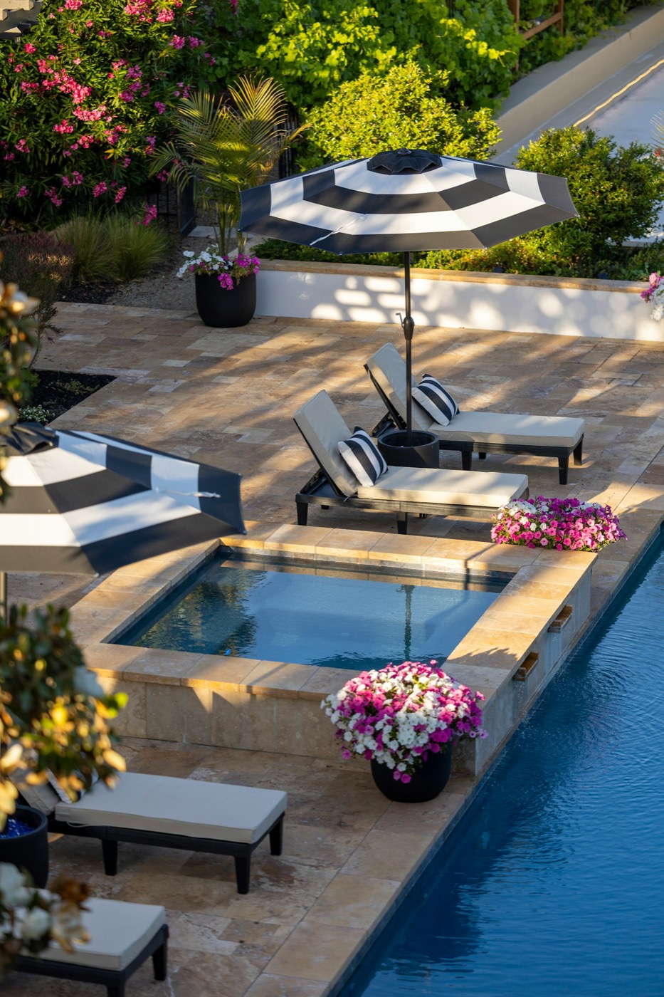 A hotel's flowered pool terrace
